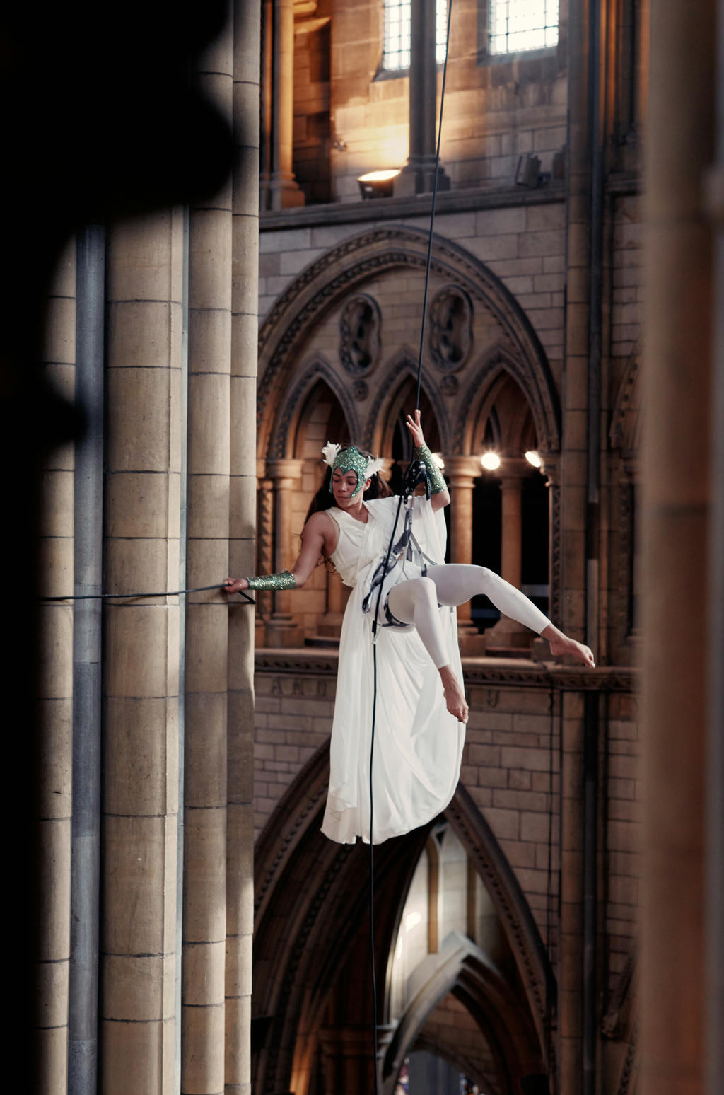 Ishita Raina from Yskynna Vertical Dance Company rehearsing in Truro Cathedral
