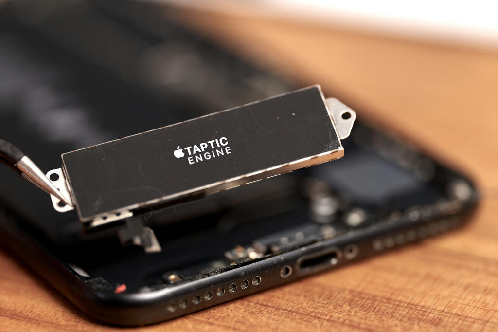 Removing the Taptic Engine from inside an iPhone 7 Plus